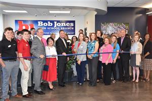 Group photo of ribbon cutting 